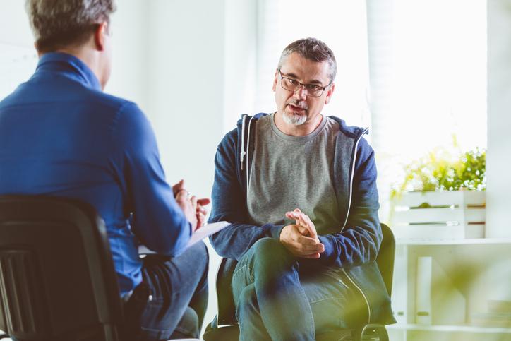 Two people in a therapy session