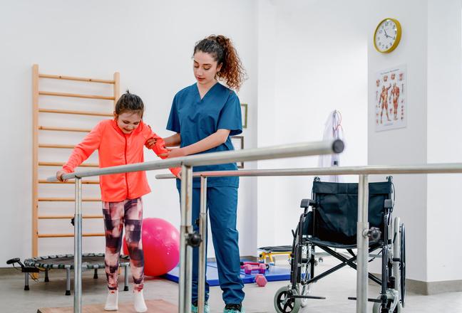 Occupational therapist assisting a patient